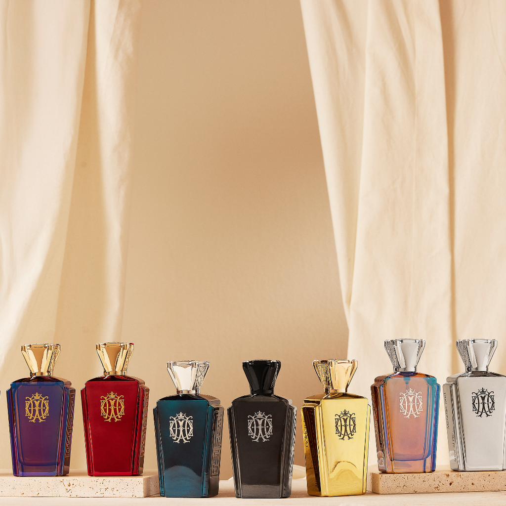 Attar Al Has – collection of seven perfumes on a beige background